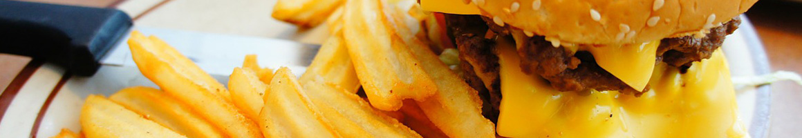 Eating Burger at Harry's Bar & Burger restaurant in Providence, RI.